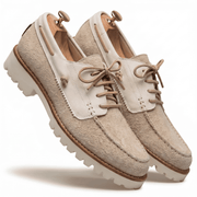 Dynamic floating angle of the beige and cream mixed-material shoes showcasing the rugged sole profile.