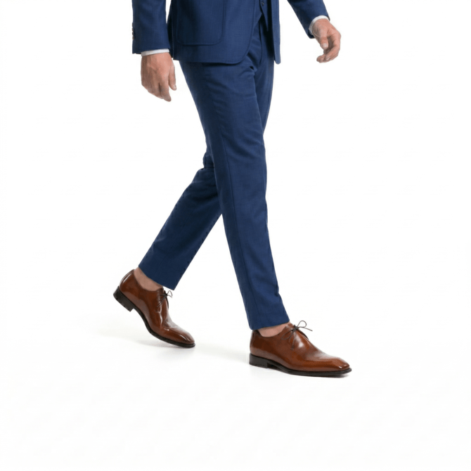 Men styling brown patina derby shoes with navy formal trousers