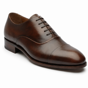 Brown leather Oxford shoes for men in side angle view