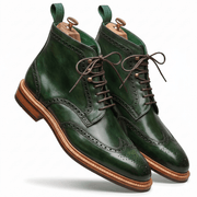 Dynamic floating angle of the green lace-up boots showing the high-shine finish and elegant silhouette.