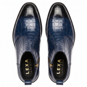 Top-down view of men's navy blue croc-patterned boots showing the gold branded insoles and tapered toe shape.