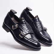 Angled view of mens navy blue croco leather double monk strap shoes