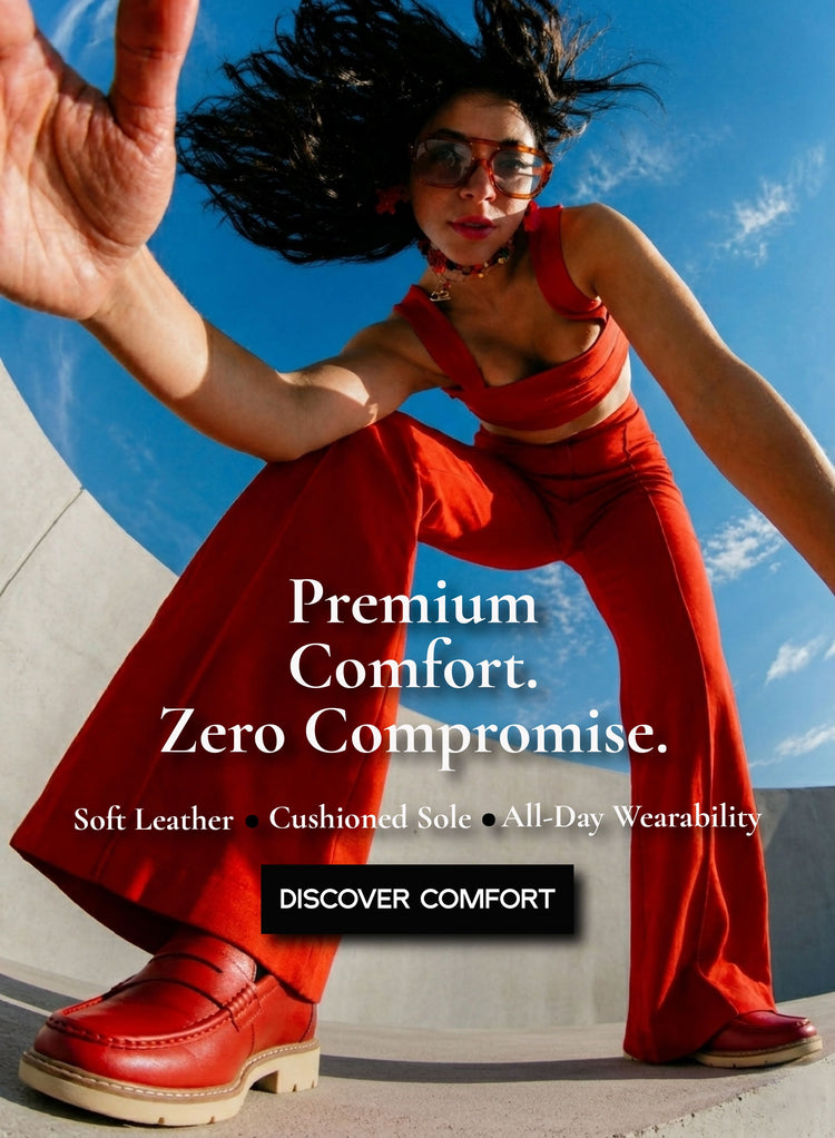 Woman wearing premium comfort leather loafers with cushioned sole and stylish all-day wearable fashion outfit outdoors