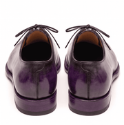 Rear view of purple patina Oxford leather shoes pair