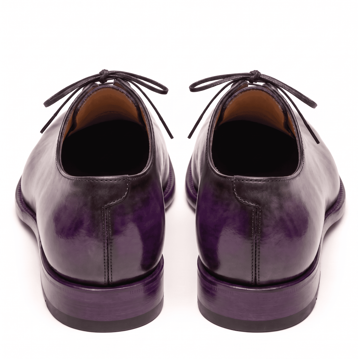 Rear view of purple patina Oxford leather shoes pair