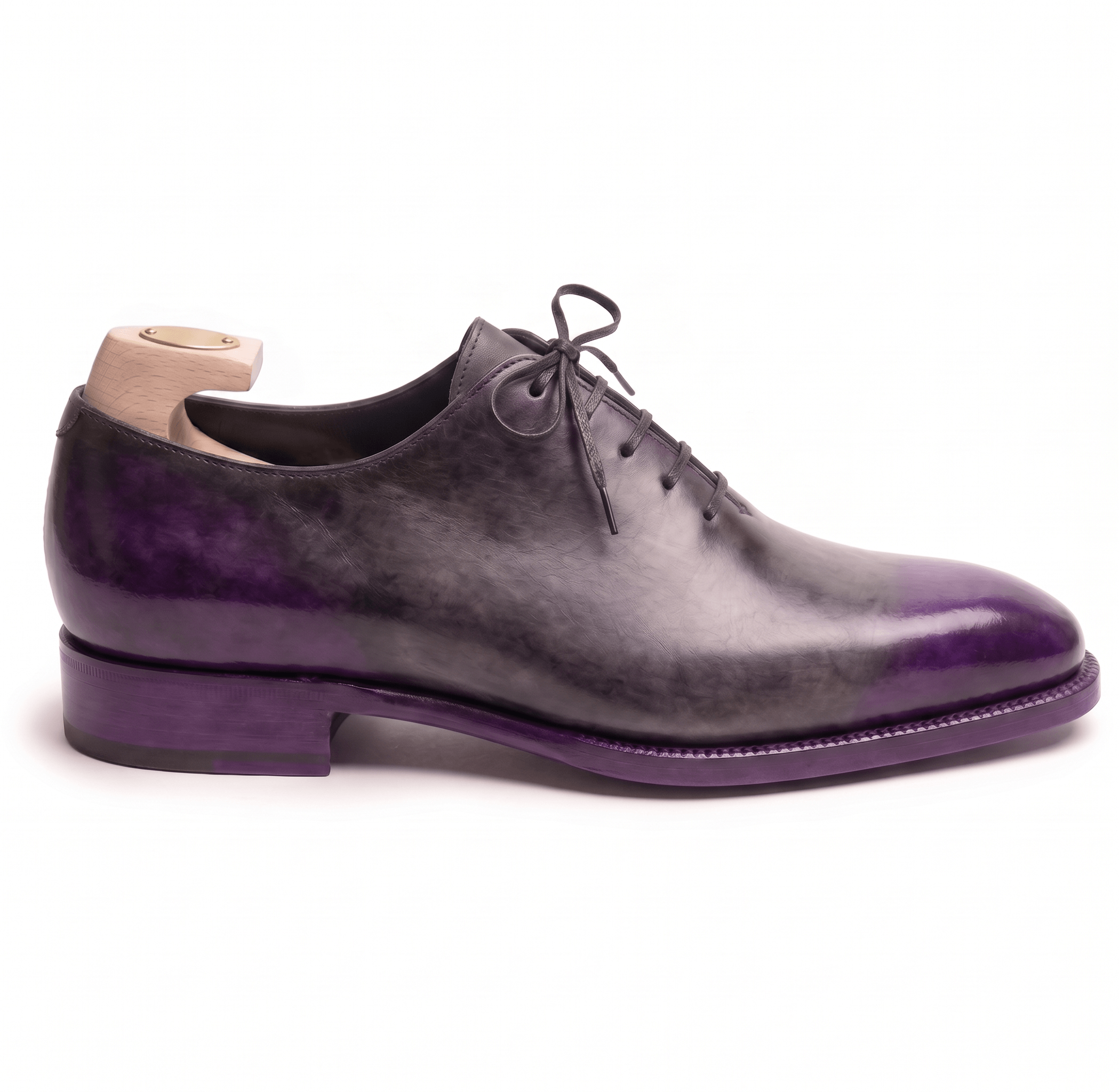 Side silhouette of purple patina Oxford leather shoes