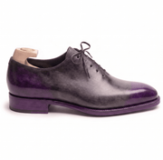 Side silhouette of purple patina Oxford leather shoes