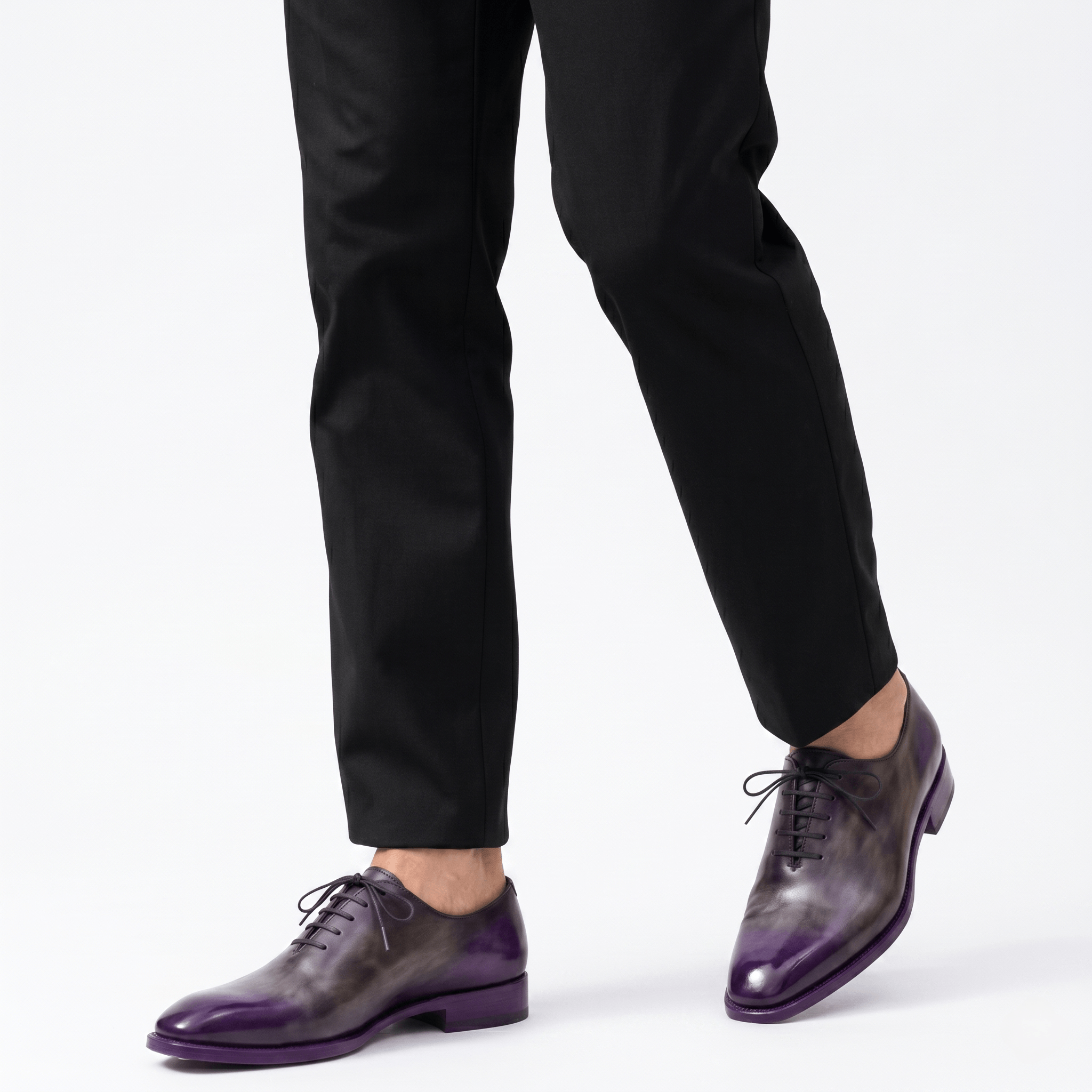 Men wearing purple patina Oxford leather shoes with black trousers