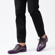 Men wearing purple patina Oxford leather shoes with black trousers