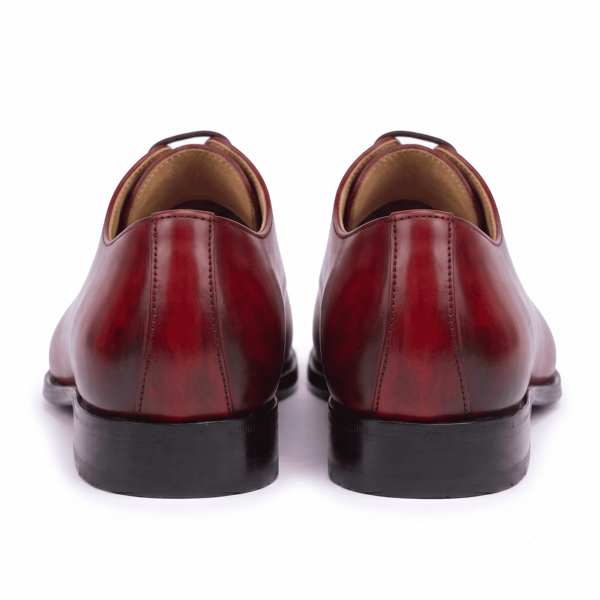 Back view of handcrafted red genuine leather Oxford shoes for men highlighting the heel and premium finish.