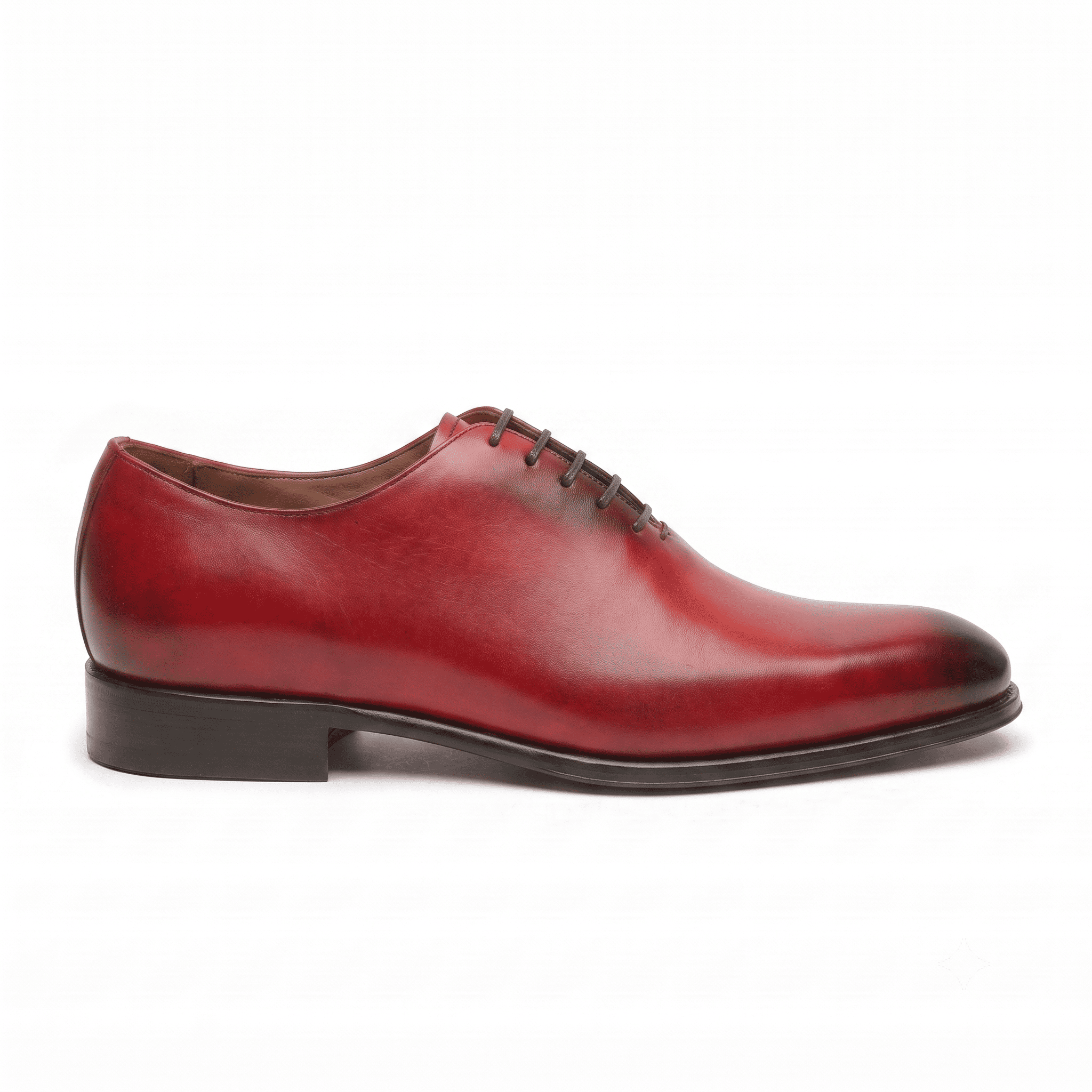 Left side view of handcrafted red leather cap-toe Oxford shoes for men with a polished finish.